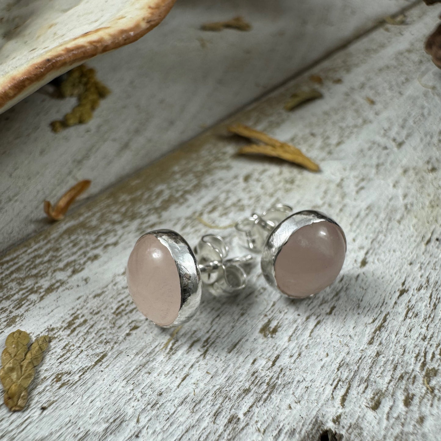 Handcrafted rose quartz stud earrings with 8mm stones set in smooth fine silver bezels from the Little Wilds collection - nature-inspired jewelry for love and emotional healing