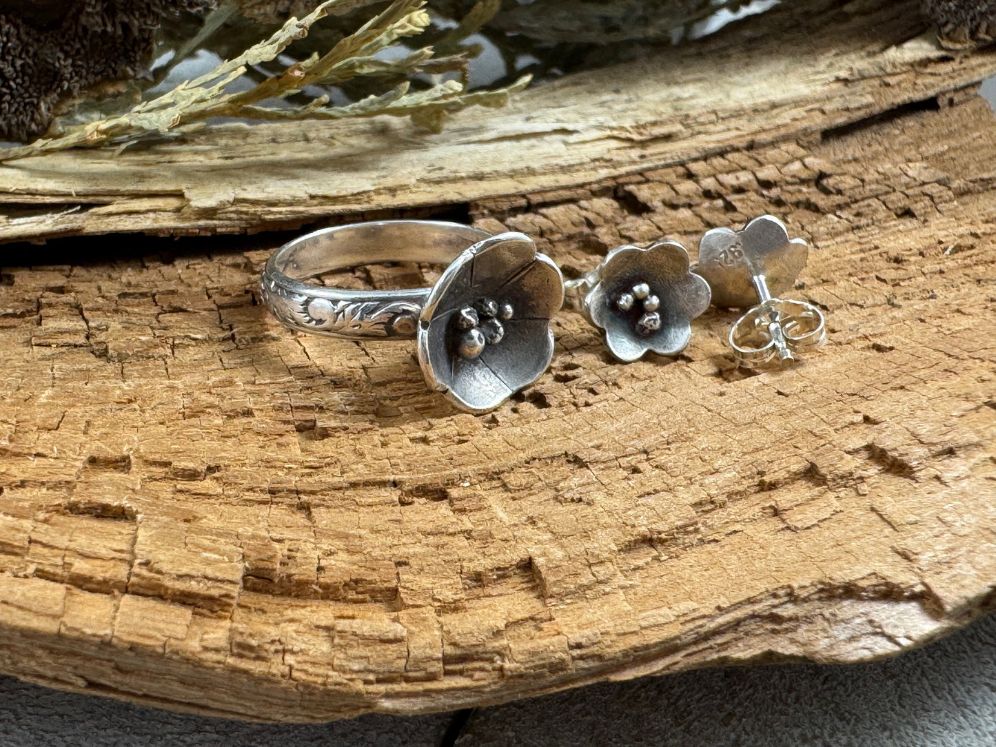 Sterling Silver Flower shaped stud earrings and matching ring by Rust and Leaf