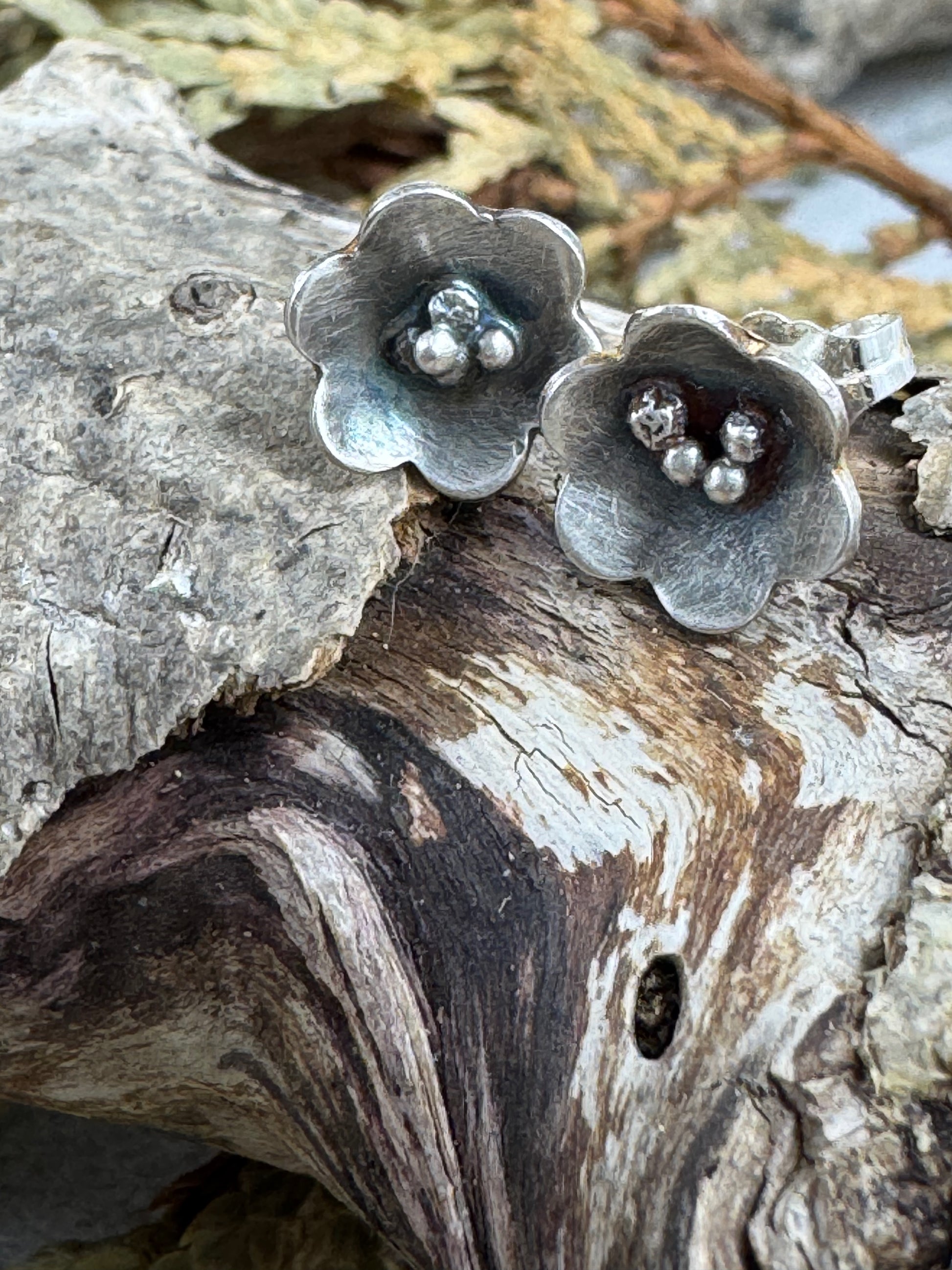 Sterling Silver Flower shaped stud earrings by Rust and Leaf