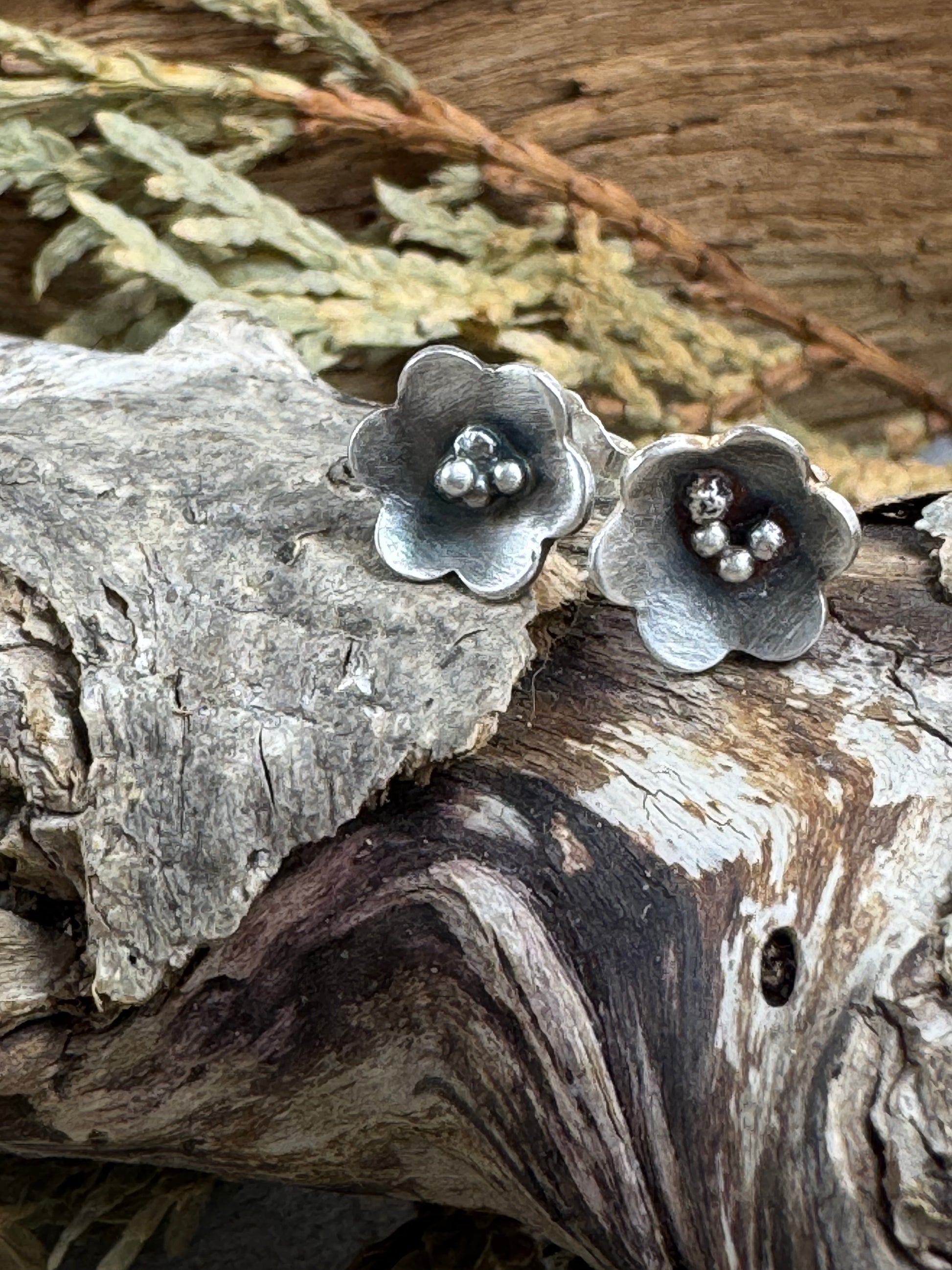 Sterling Silver Flower shaped stud earrings by Rust and Leaf