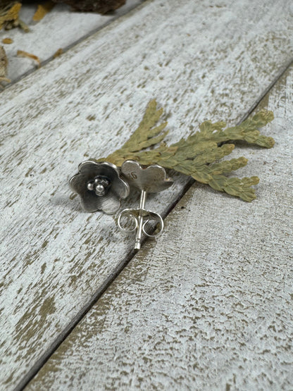 Sterling Silver Flower shaped stud earrings by Rust and Leaf