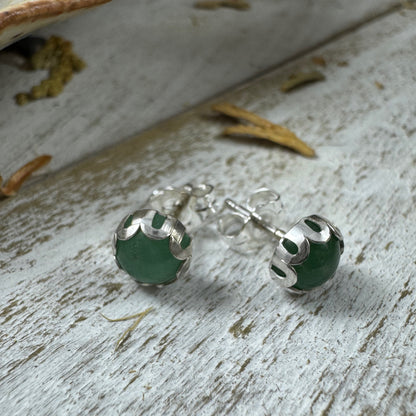 Handmade sterling silver green aventurine stud earrings with 6mm stones, shown in flower and smooth bezel styles from the Little Wilds collection - earthy, poetic jewelry for heart-centered growth
