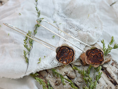 Gypsy Flower Earrings with Vintage Pansy lying on the side of a vintage doily