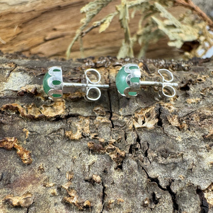 Handmade sterling silver green aventurine stud earrings with 6mm stones, shown in flower and smooth bezel styles from the Little Wilds collection - earthy, poetic jewelry for heart-centered growth