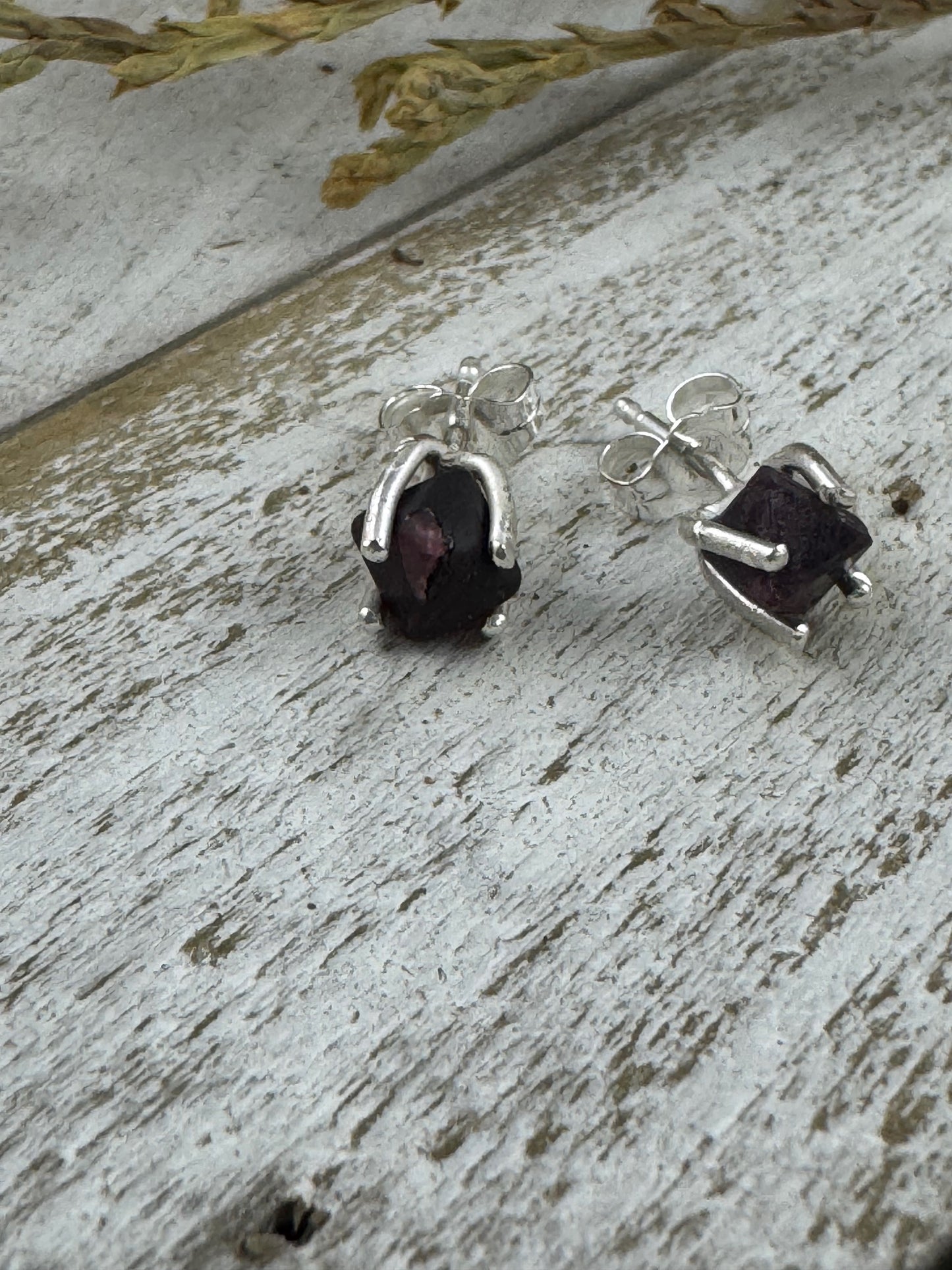 Sterling silver stud earrings with small 4 mm rough-cut spinel gemstones in natural shapes; handcrafted settings with optional tree bark texture.