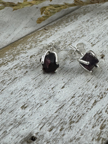 Sterling silver stud earrings with small 4 mm rough-cut spinel gemstones in natural shapes; handcrafted settings with optional tree bark texture.