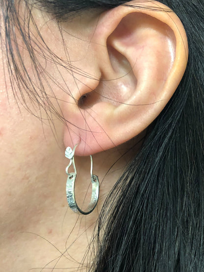 Tree Bark Hoops showing as worn on ear of model