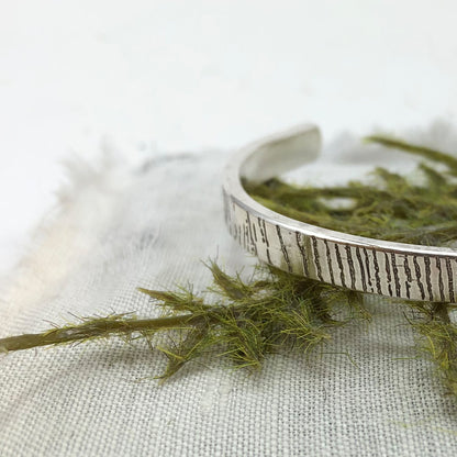 Sterling silver cuff bracelet with tree bark texture