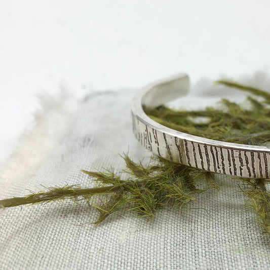 Sterling silver cuff bracelet with tree bark texture